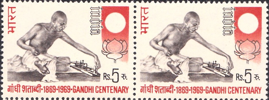 Gandhi with Spinning Wheel (Charkha), Sun (Truth) & Lotus (Non-Violence)